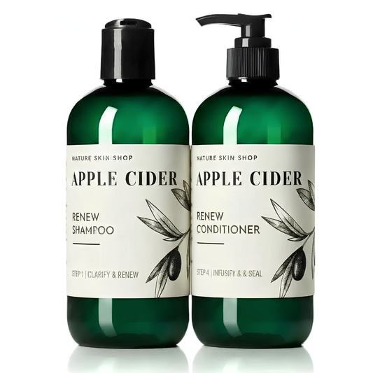 Two dark green plastic bottles from Nature Skin Shop, labeled Apple Cider Renew Shampoo and Apple Cider Renew Conditioner, with black pump and cap tops, shown on a white background.