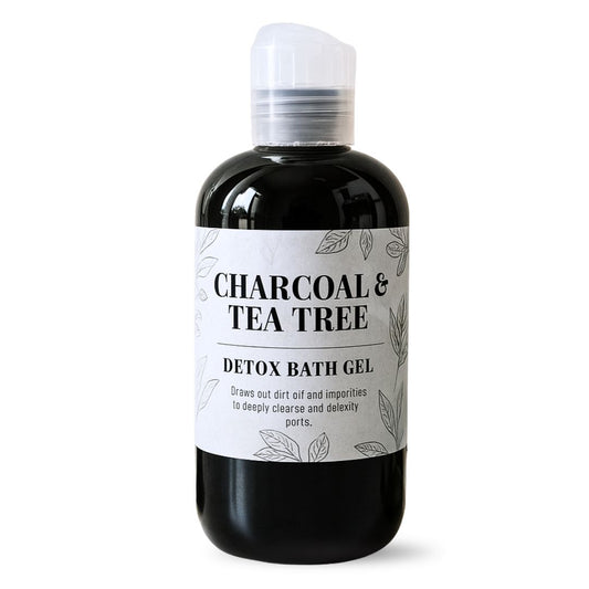 Bottle of Charcoal & Tea Tree Detox Bath Gel on a white background