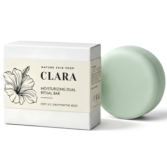 Nature Skin Shop Clara Moisturizing Dual Ritual Bar soap shown as a pale mint green oval bar next to its white cardboard packaging box with a beige label.