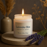 Lavender Bliss candle with a label on a wooden surface with lavender and dried plants. Lavender Bliss candle with a label on a wooden surface with lavender and dried plants.