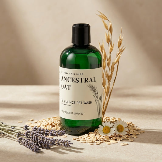 Green bottle of Ancestral Oat Pet Wash with natural elements on a beige background