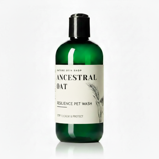 Green bottle of 'Ancestral Oat' resilience pet wash on a white background