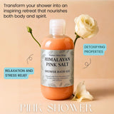 Bottle of Himalayan Pink Salt Shower Bath Gel with a white rose on a beige background Bottle of Himalayan Pink Salt Shower Bath Gel with a white rose on a beige background