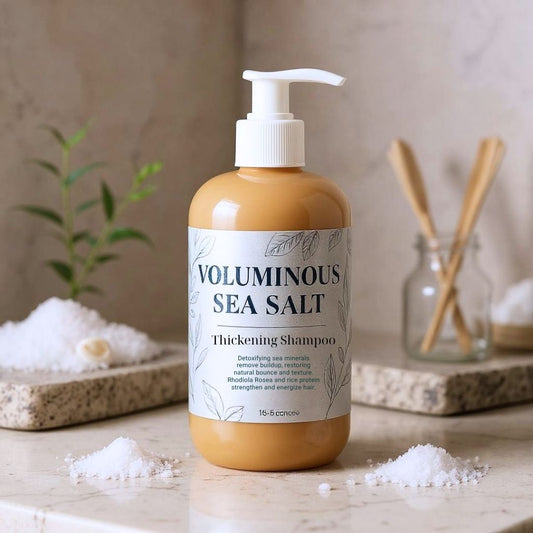 Bottle of voluminous sea salt shampoo on a neutral background with decorative elements.