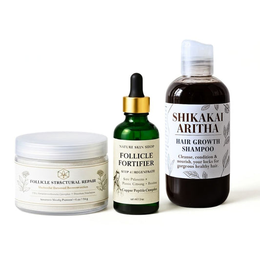 Set of skincare and hair care products including a jar, dropper bottle, and shampoo bottle on a white background.