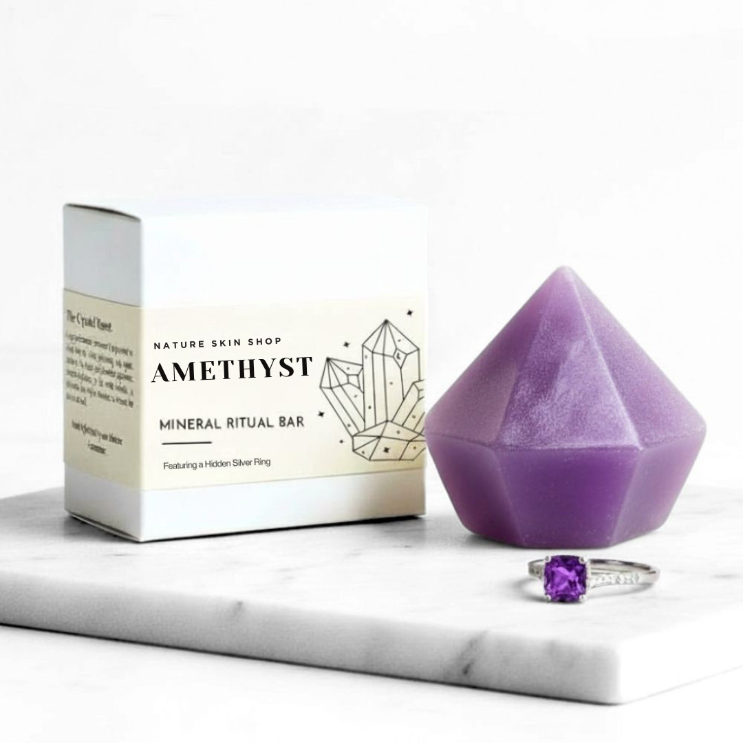 Amethyst mineral ritual bar and ring on a marble surface with a white background