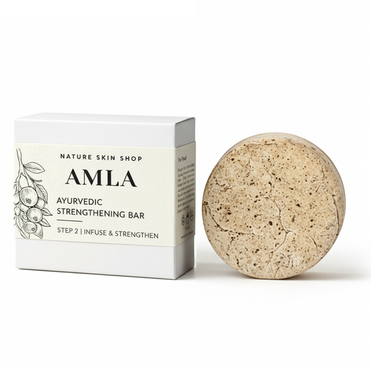 Amla ayurvedic strengthening bar and its packaging on a white background