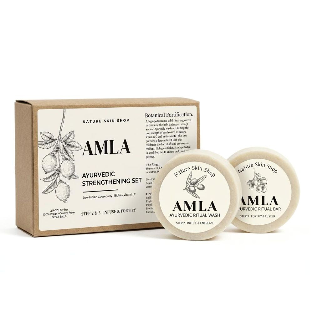 Amla skincare set with packaging and two containers on a white background