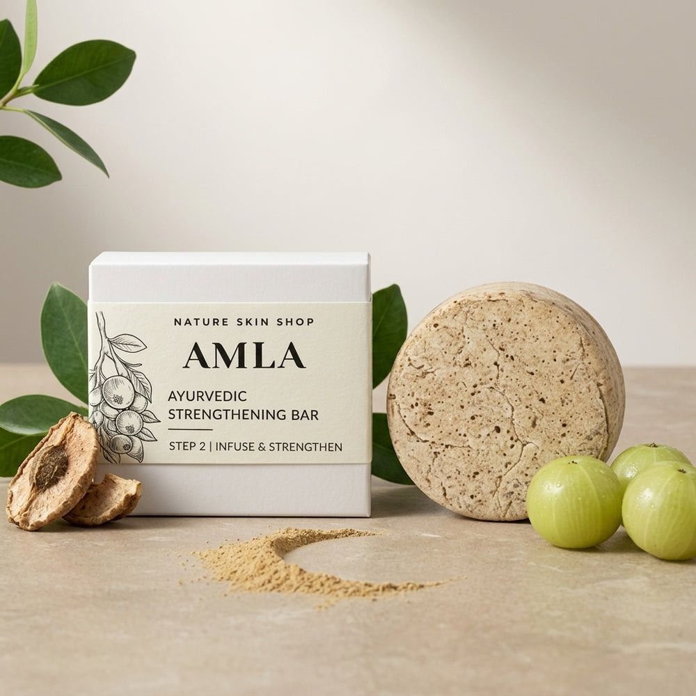 Amla Ayurvedic Strengthening Bar from Nature Skin Shop with packaging, a bar, and fruits on a neutral background.