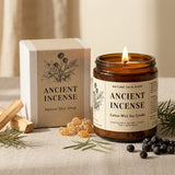 Ancient Incense candle from Nature Skin Shop with packaging and natural elements on a neutral background