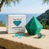 Aquamarine gem soap with packaging and a ring on a natural background