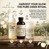 Three skincare products from Nature Skin Shop are displayed on a wooden surface with illustrative botanical graphics and text overlays. The products are: Skin Balancing Foaming Cleanser (apple cider), Skin Balancing Acid Ritual Toner (fermented), and Clear Apple Cider & Asia Face Cream.