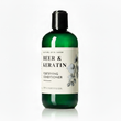 Green bottle of 'Beer & Keratin' fortifying conditioner on a white background