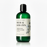 Green bottle of 'Beer & Keratin' fortifying conditioner on a white background