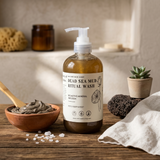 Dead Sea Mud Ritual Wash bottle on a wooden surface with natural elements