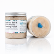 Jar of Dead Sea Salt & Bio-Marine Foaming Polish with a blue heart on a white background
