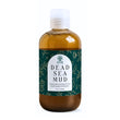 Bottle of Dead Sea Mud with a green label on a white background
