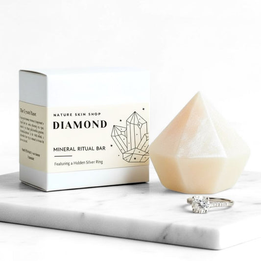 Diamond mineral ritual bar with packaging and a ring on a marble surface