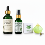 Skincare products including a dropper bottle, serum, soap, and gemstone ring on a white background