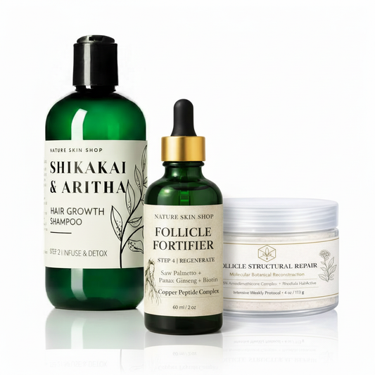 Set of hair care products including shampoo, fortifier, and repair cream on a white background