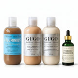 Set of hair care products including shampoo, conditioner, and serum on a white background