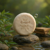 Gugol soap bar on a rock with a natural background