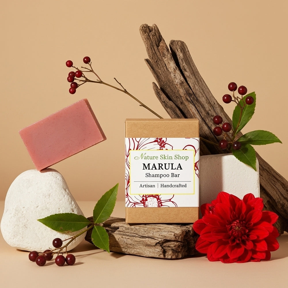 Marula shampoo bar with a red flower and natural elements on a beige background