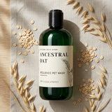 Bottle of 'Ancestral Oat' pet wash surrounded by oats on a textured surface