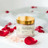 Jar of Pink Himalayan and Rose Manjistha polish with gold lid on a white background with red rose petals.