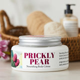 Jar of Prickly Pear Nourishing Body Crème on a surface with a blurred background