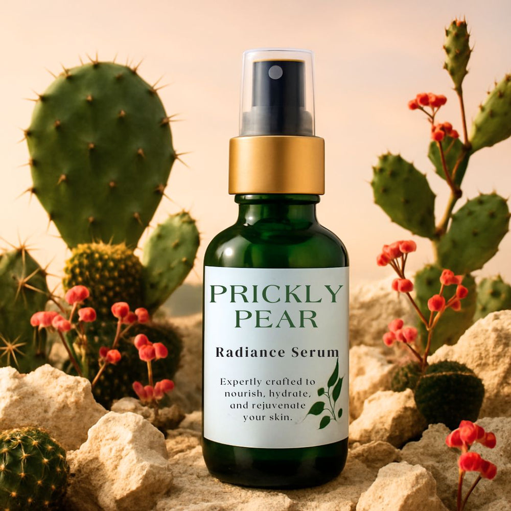 Prickly Pear Radiance Serum bottle with cactus and succulent plants in the background