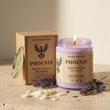 Phoenix candle with packaging and lavender flowers on a neutral background