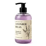 Bottle of Lavender Relax Therapeutic Ritual Wash with pump on a white background