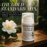 Renewal Glycolic 12% Face Cream on a wooden surface with a white flower and green leaves.