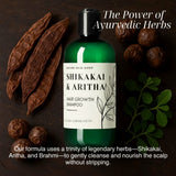 Shikakai & Aritha hair growth shampoo bottle with Ayurvedic herbs on a dark background
