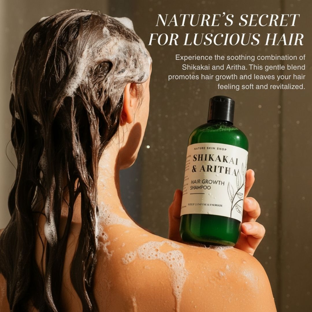 Person with shampoo on hair holding a bottle of Shikakai & Aritha shampoo against a neutral background.