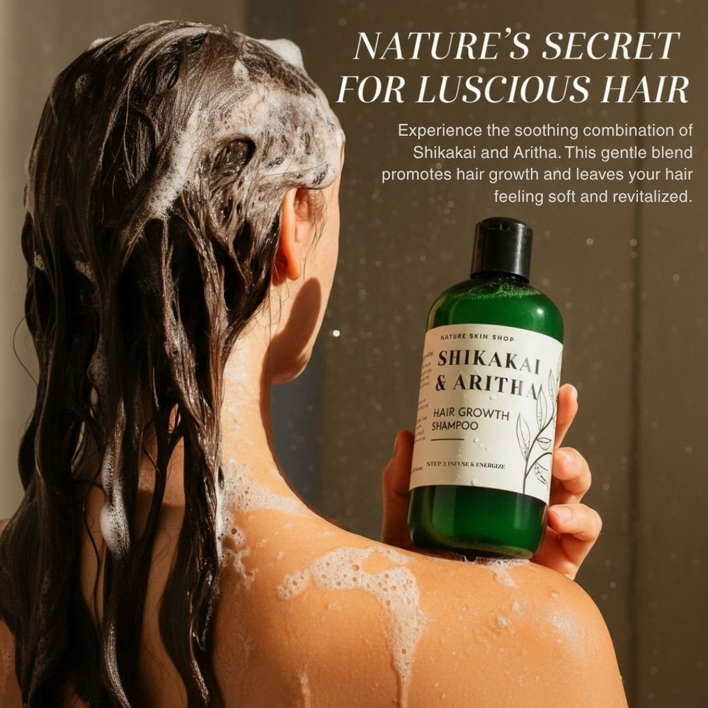 Person with shampoo on hair holding a bottle of Shikakai & Aritha shampoo against a neutral background.
