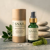 Snail Green Caviar repair intensive serum from Nature Skin Shop with packaging and green grapes on a neutral background.