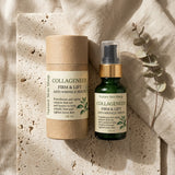 Collagen-based skincare products on a textured beige surface with eucalyptus leaves.