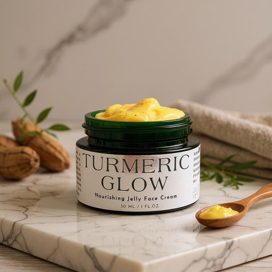 Jar of Turmeric Glow face cream on a marble surface with turmeric roots and a wooden spoon.