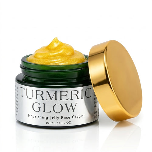 A jar of Turmeric Glow Nourishing Jelly Face Cream with a gold lid leaning against it, showing a dollop of golden-yellow cream inside a dark green jar with a white label, on a white background.