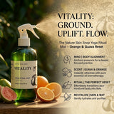 Vitality Yoga Ritual Mist bottle with oranges and guava on a wooden surface, surrounded by nature-themed text and graphics.
