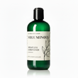 Green bottle of 'Voluminous' weightless conditioner on a white background