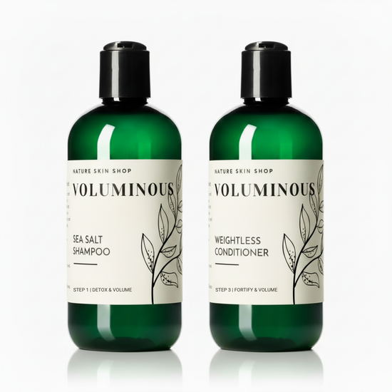 Two green bottles of 'Voluminous' shampoo and conditioner on a white background