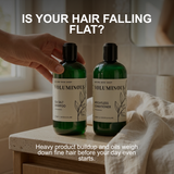 Two bottles of Voluminous shampoo and conditioner on a bathroom counter with text about hair falling flat.