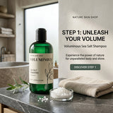 A bottle of Nature Skin Shop Voluminous Sea Salt Shampoo stands on a dark stone countertop in a bathroom setting, with a folded beige towel, a small dish of white shampoo granules, and a green leaf sprig nearby. Text on the right reads 'STEP 1: UNLEASH YOUR VOLUME' and 'Voluminous Sea Salt Shampoo' with a 'DISCOVER STEP 1' button.